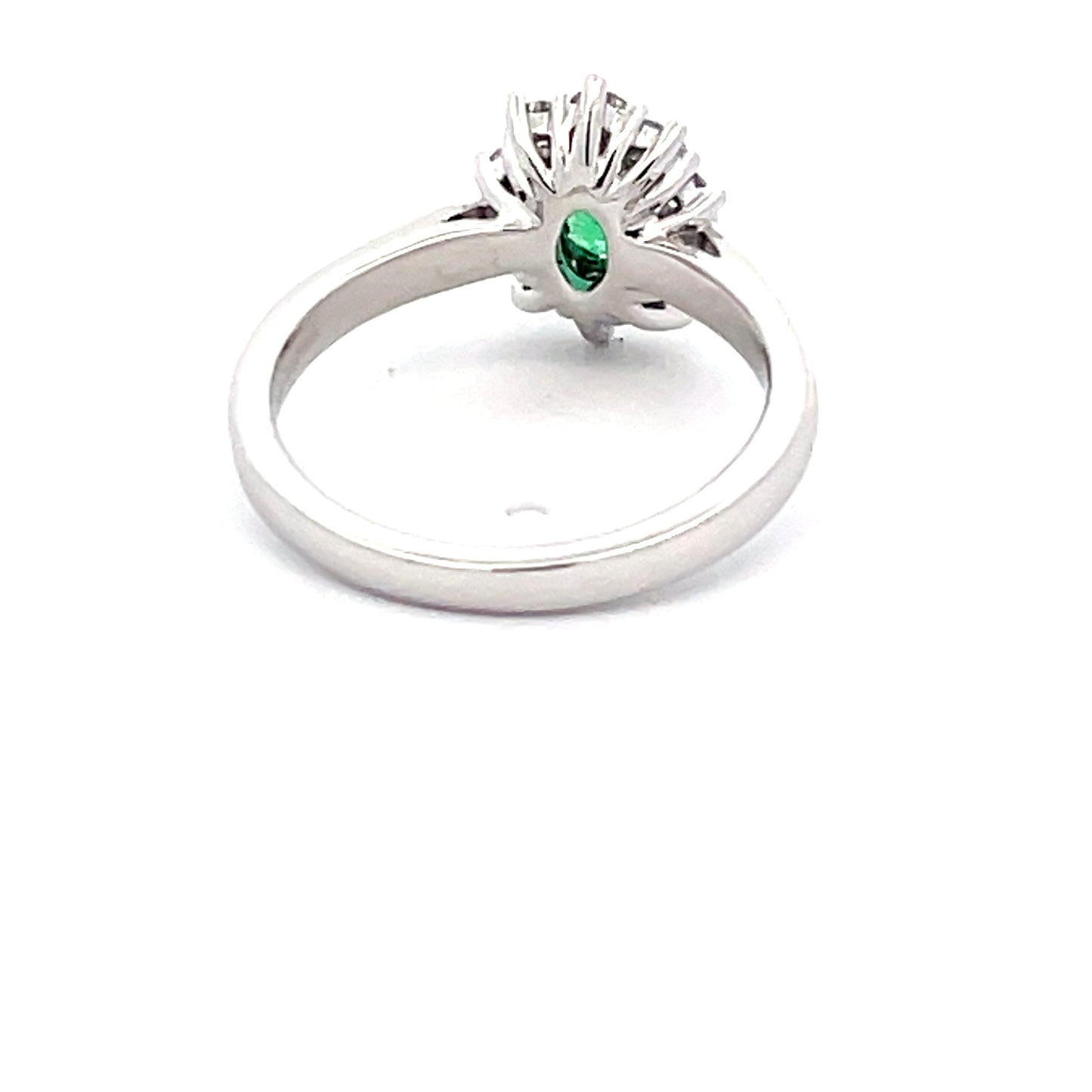 Emerald and round brilliant cut diamond cluster style ring  Gardiner Brothers   