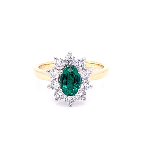 Oval Emerald and Round Brilliant Cut Diamond Cluster Ring  Gardiner Brothers   