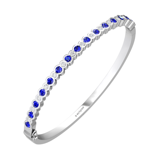 Eclipse Collection Sapphire and Diamond Bangle  Gardiner Brothers 18ct White Gold  